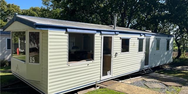 2003 Atlast Moonstone side view with door and windows