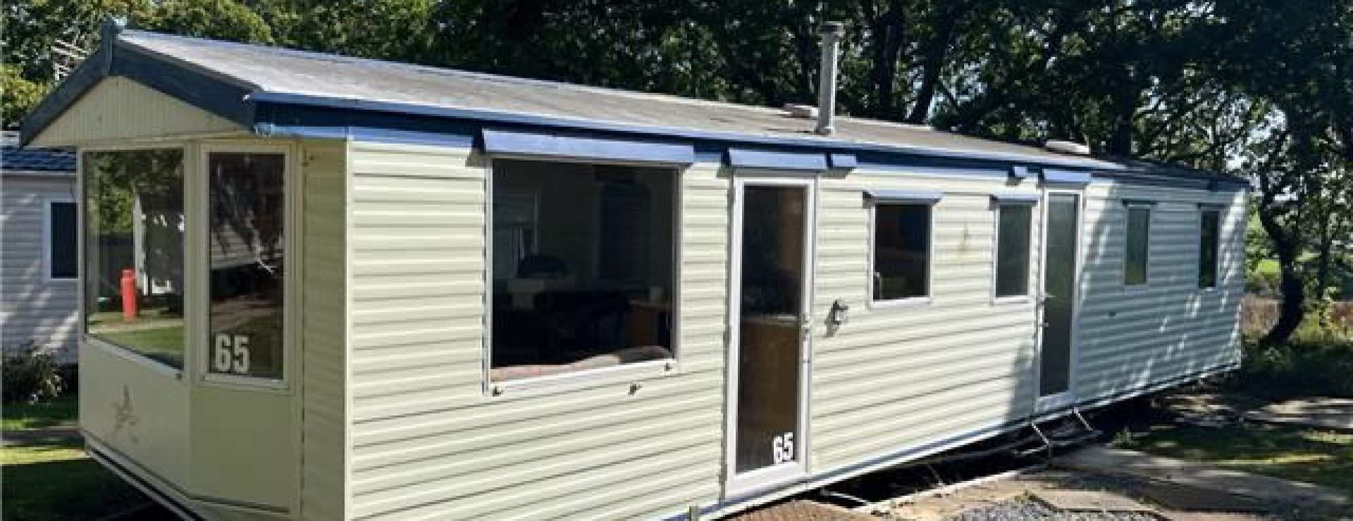 2003 Atlast Moonstone side view with door and windows